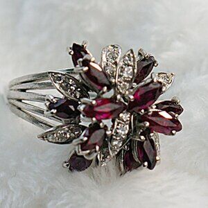 Palladium ring with natural rubies and diamonds, 2.50 tcw. Weight is 7.77 grams